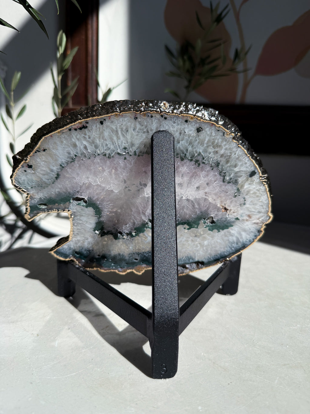 agate wing on Black iron display stand 