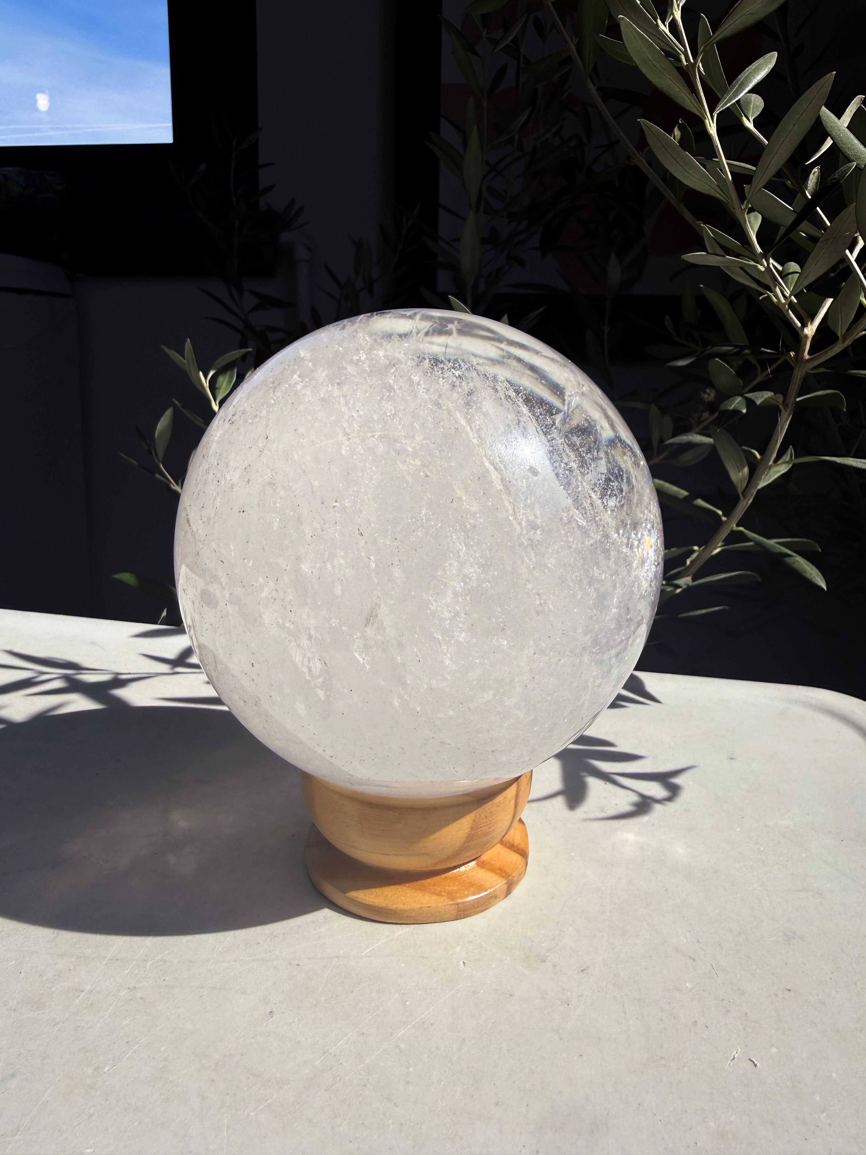 white Brazilian Lemurian Quartz crystal Sphere