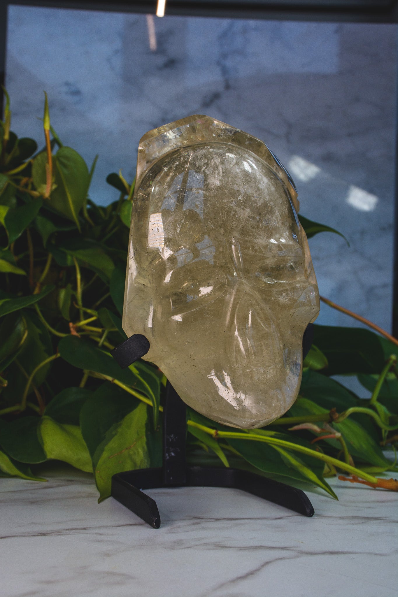 Large Hand polished Quartz Skull Shaped Specimen on Stand