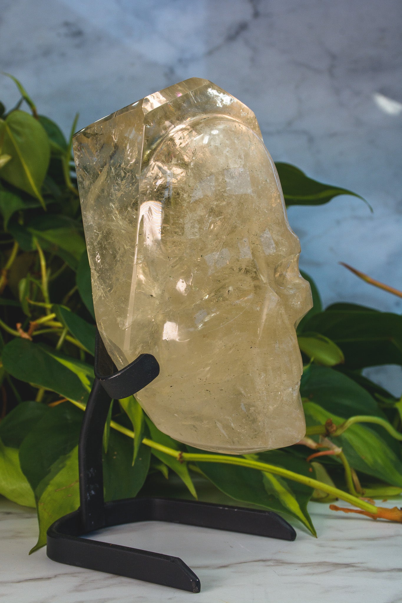 Large Hand polished Quartz Skull Shaped Specimen on Stand