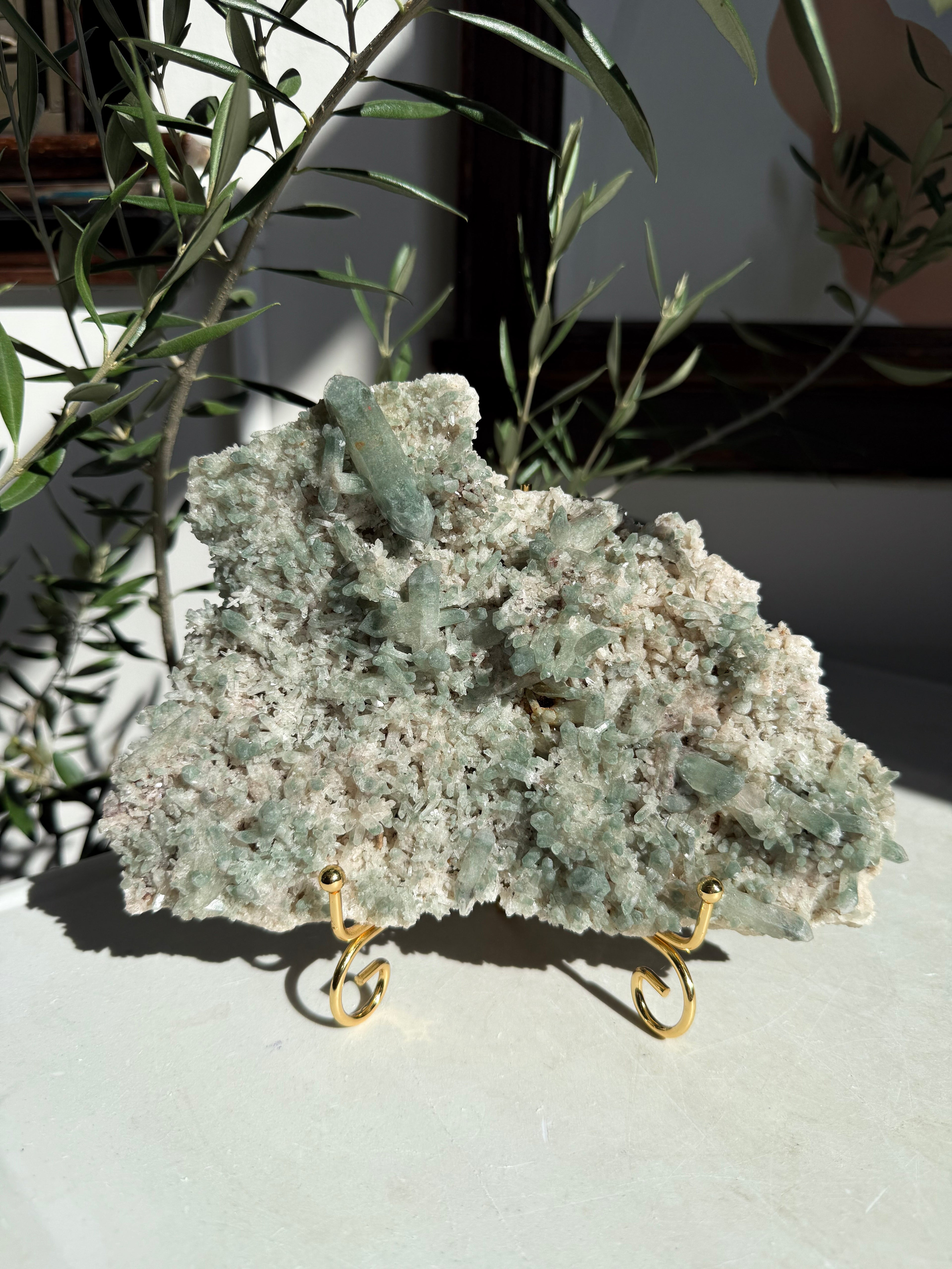Green Chlorite and inclusion quartz cluster on gold stand