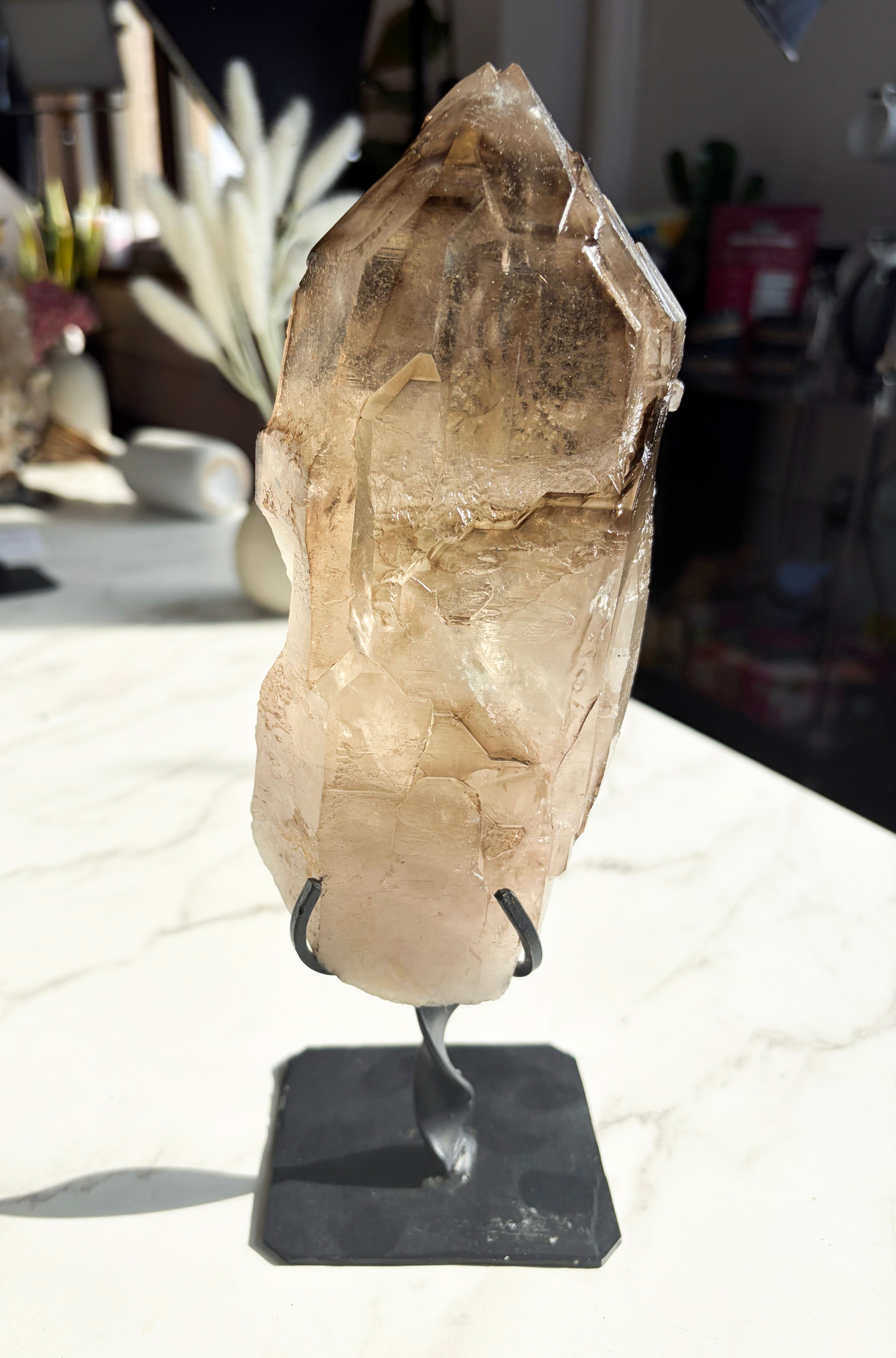 smoky brazilian Citrine on Stand, white countertop