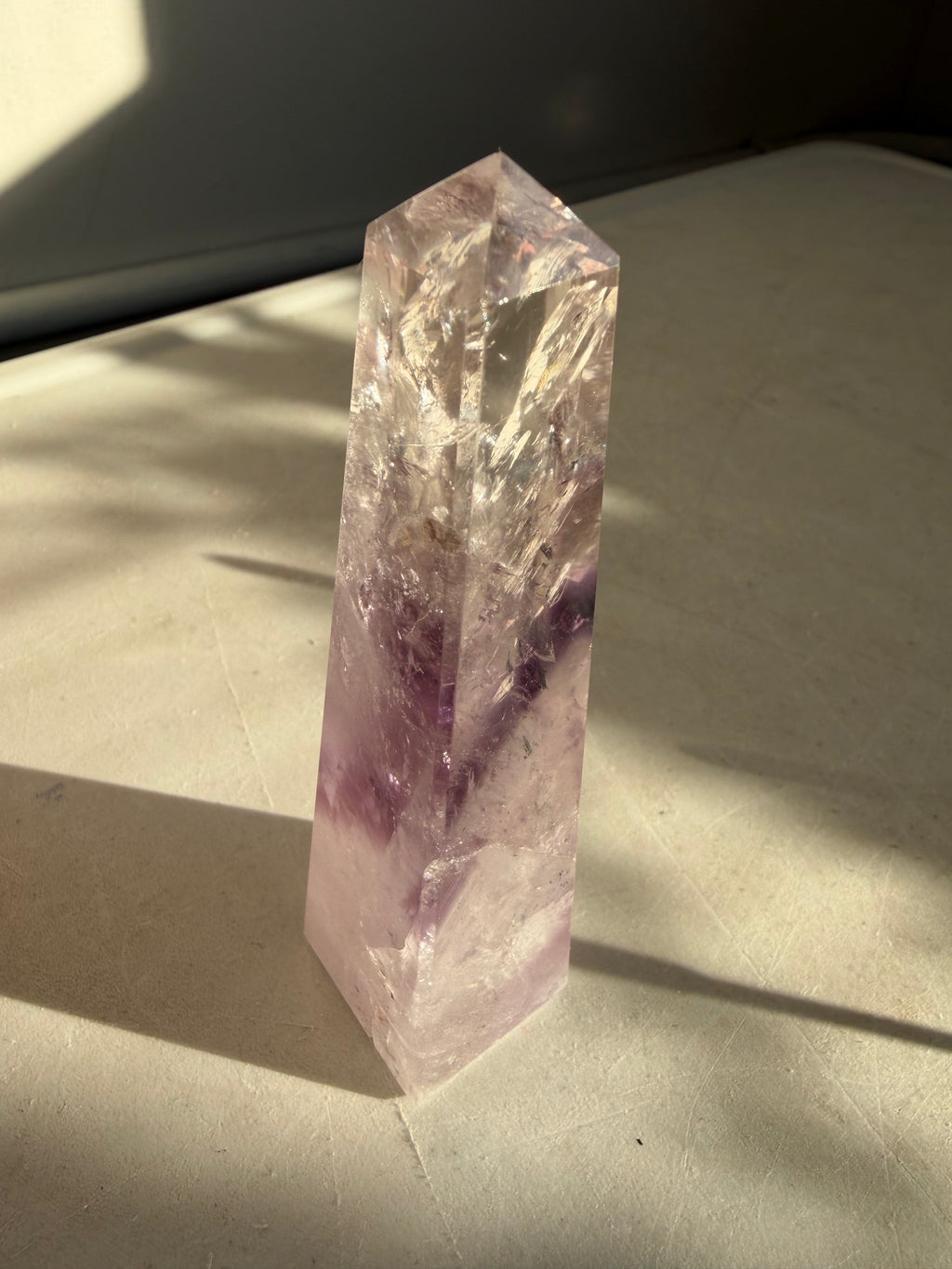 amethyst tower on white countertop
