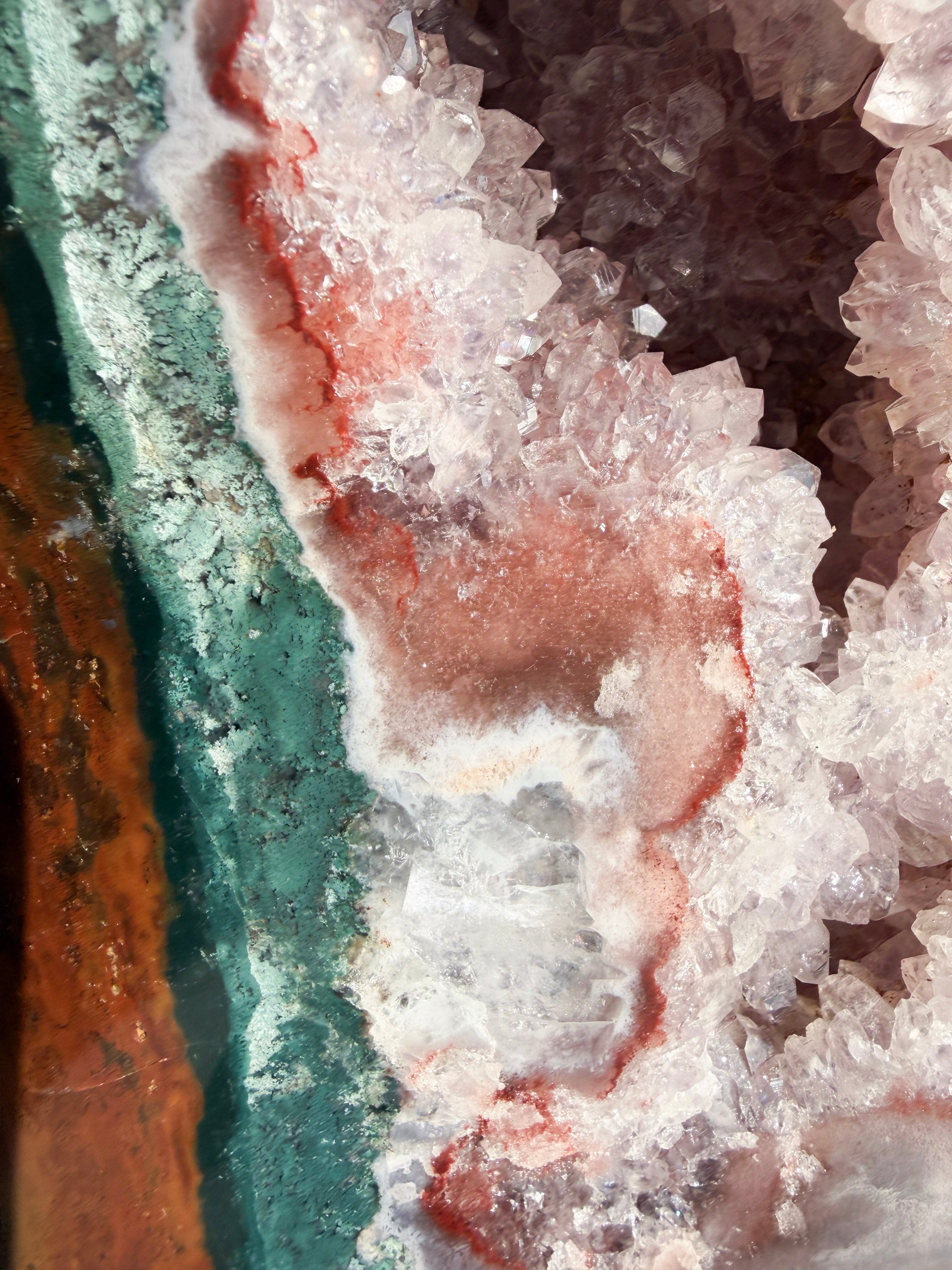 close up of pink amethyst with red and green jasper