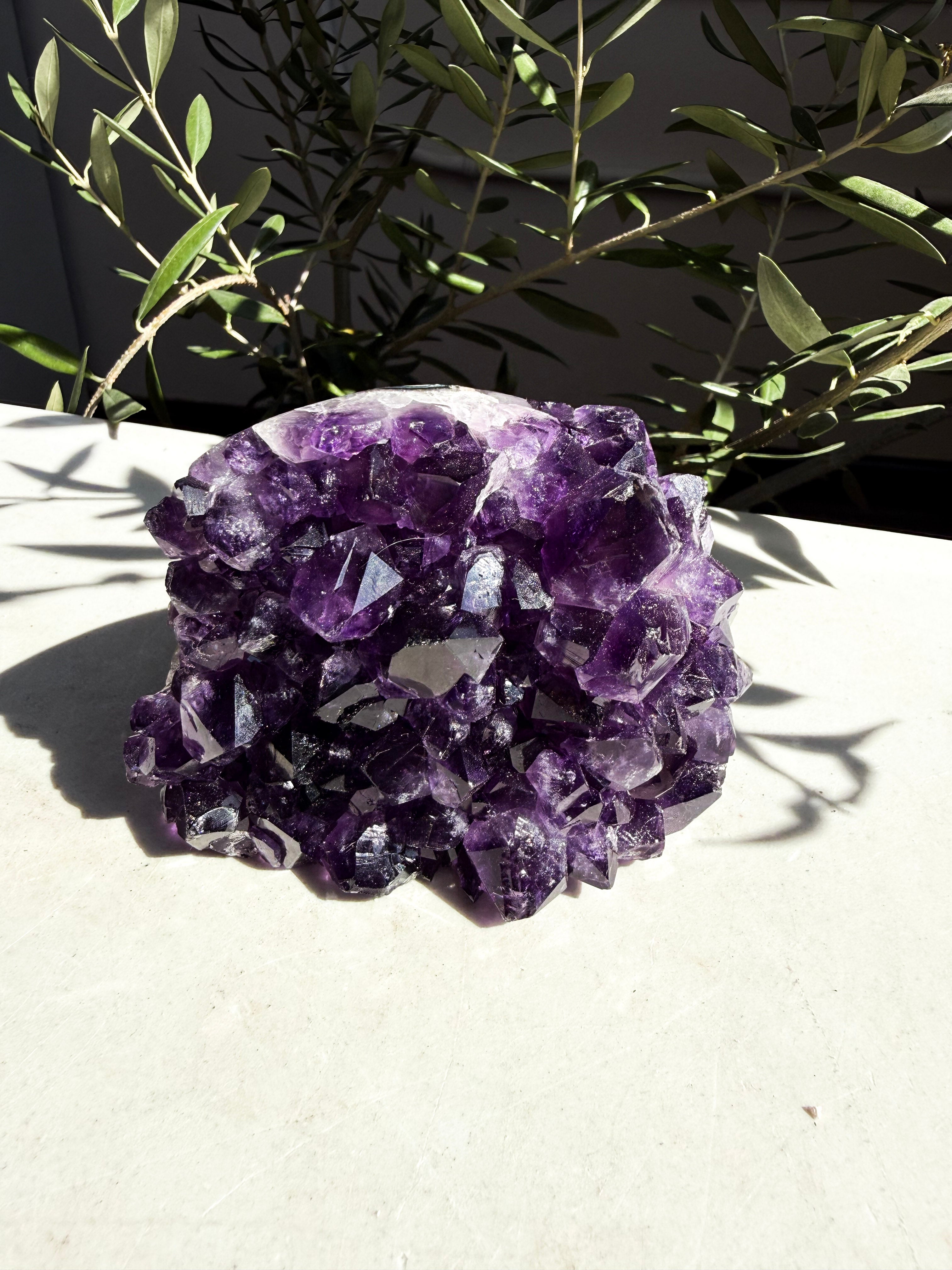 dark purple and gemmy side-polished amethyst