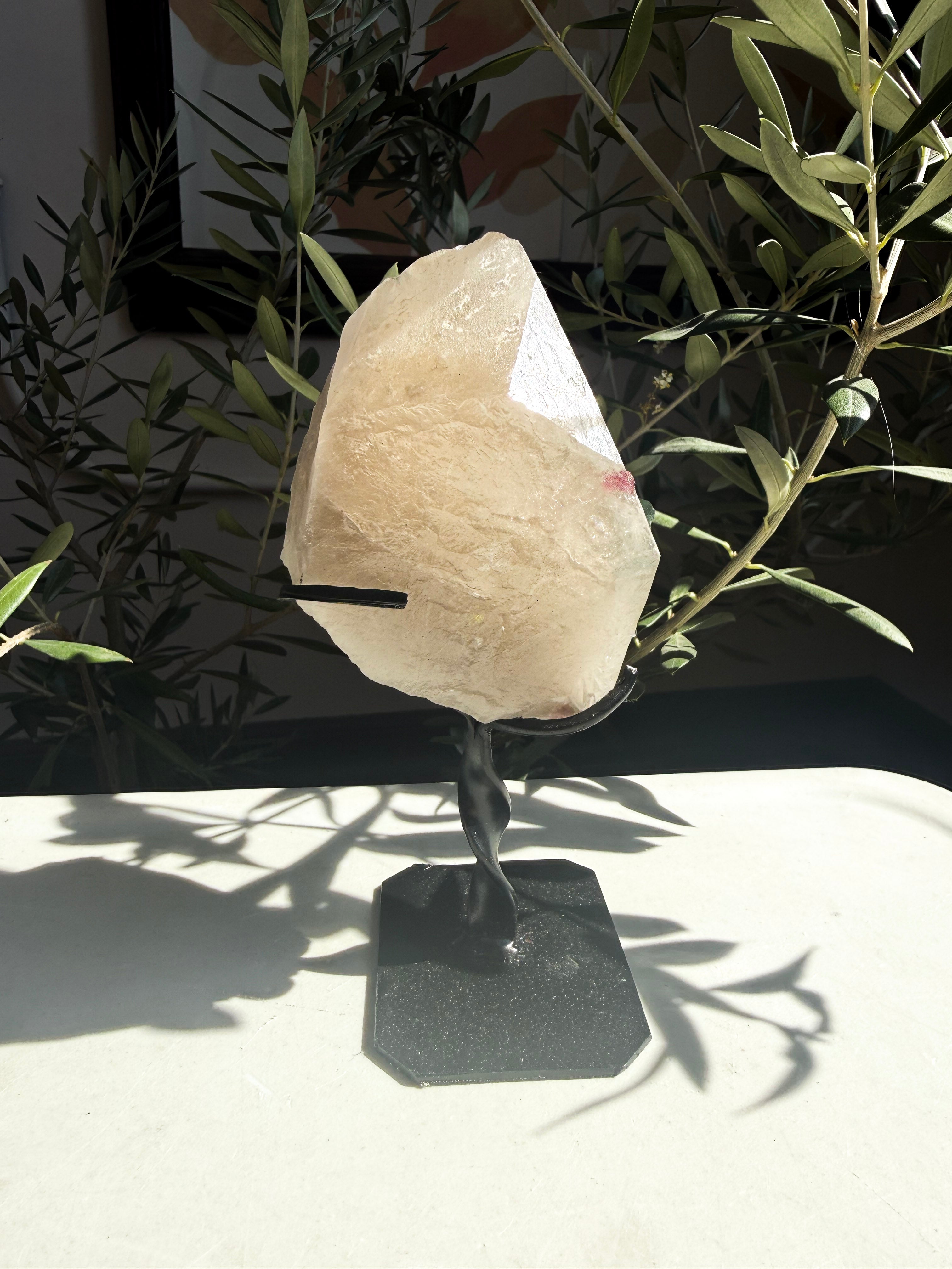 close up of natural citrine matrix on a metal stand
