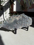 sparkly and bubbly emerald green amethyst flower plate on metal stand. 