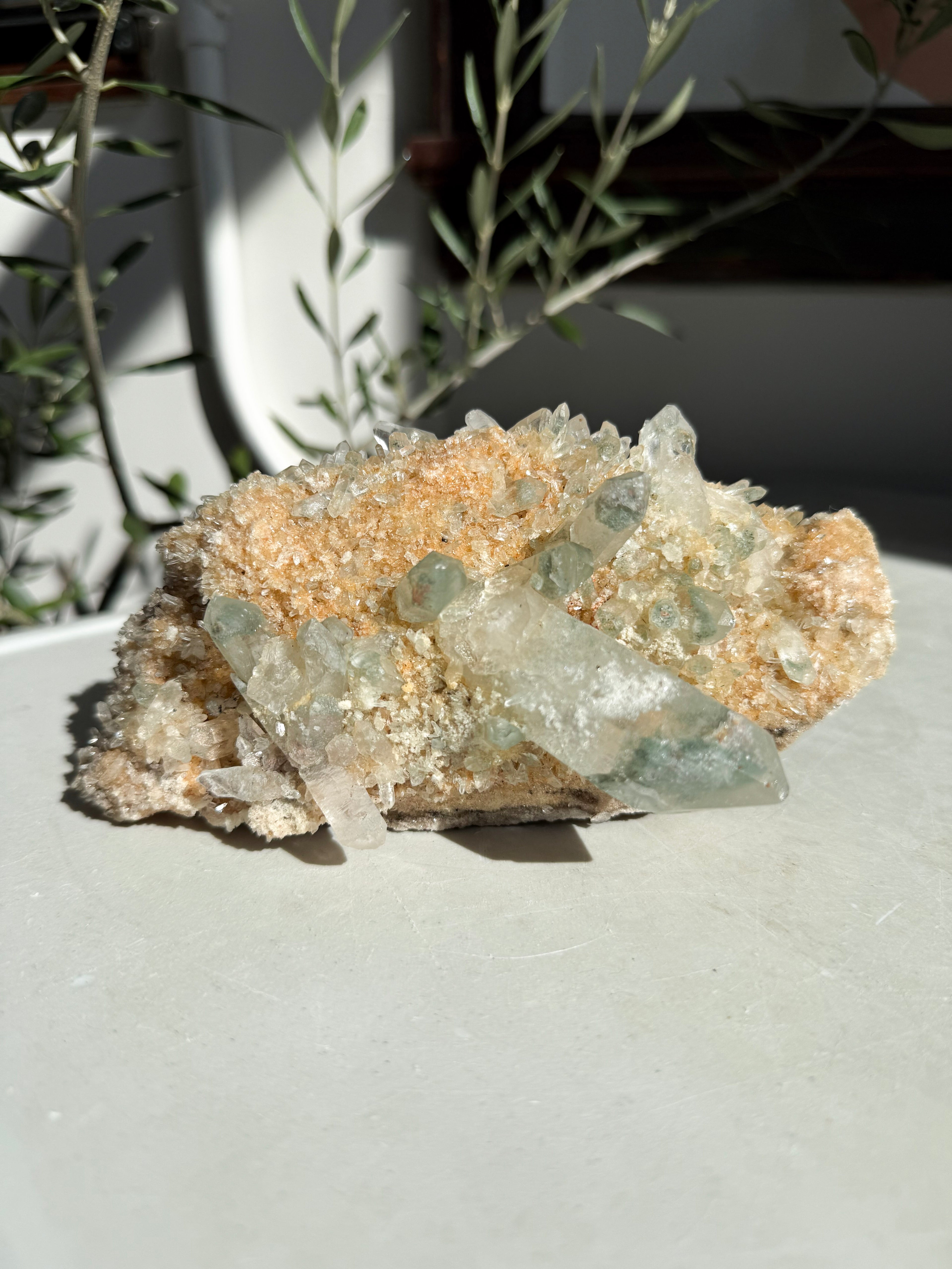 Chlorite Quartz Cluster on marble counter
