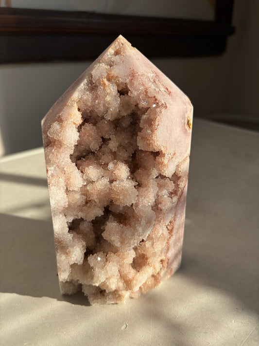 A stunning statement sized Pink Amethyst Tower with delicate rose-hued amethyst crystals adorned with shimmering botryoidal druz. 